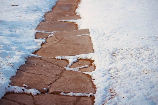 How to Choose the Best Driveway Type for Harsh NYC WeatherLiving in New York City means dealing with extreme weather — from heavy snow and freezing temperatures to summer heat and rain. If you're planning to install or upgrade your driveway, choosing the right material is crucial for long-term durability and performance. Let’s explore the most common driveway types and how they hold up in NYC’s unpredictable climate.  1. Concrete Driveways Best for: Longevity, load-bearing, low maintenance Concrete is a popular choice for NYC homeowners due to its strength and clean finish. It can withstand snow plows and vehicle traffic without degrading. However, freeze-thaw cycles can cause cracks over time. Using a high PSI mix and proper sealing can help prevent damage.  2. Asphalt Driveways Best for: Affordability, quick installation Asphalt performs well in cold climates because it’s flexible and less likely to crack. But NYC summers can soften the surface, leading to damage from heavy vehicles. Routine maintenance like sealing is essential to extend its lifespan.  3. Gravel Driveways Best for: Drainage, low cost upfront Gravel offers excellent drainage, which is helpful during heavy rains or snowmelt. However, it may require frequent regrading, and snow removal can be a challenge. Want to know how gravel compares directly to concrete? Check out this in-depth comparison.  4. Pavers Best for: Curb appeal, repair flexibility Interlocking pavers are durable and can be replaced individually if damaged. They’re great for freeze-thaw resistance but require professional installation and a good base to prevent shifting.  5. Permeable Driveways Best for: Eco-conscious properties, drainage control Permeable driveways reduce runoff by allowing water to filter through. While great for the environment, they may need regular cleaning and aren't always ideal for high-traffic areas.  Final Thoughts When choosing the best driveway type for NYC weather, consider more than just appearance. Think about maintenance, drainage, snow removal, and long-term durability. Concrete remains a strong all-around option, but each material has its place depending on your property and budget.  Before deciding, do your homework — or start with this helpful comparison: 👉 Is Gravel Better Than Concrete for Your Driveway?