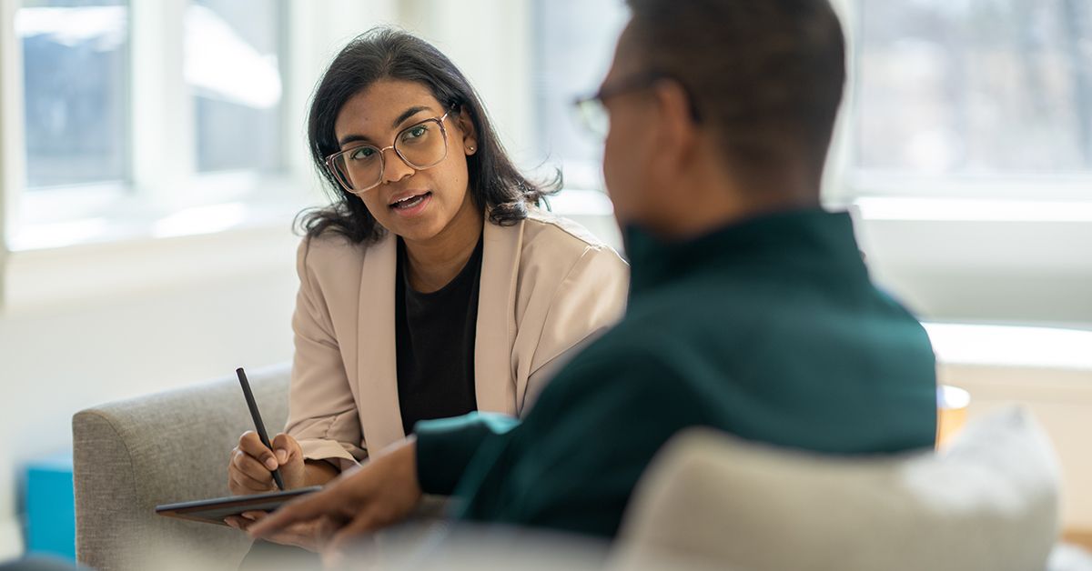 woman-therapist-counseling-psychiatrist-talking-with-male-patient-1200x628-facebook