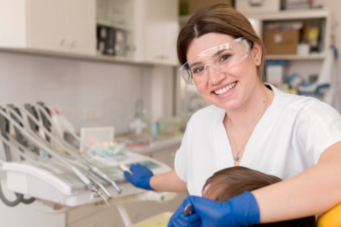 dentist-cleaning-child-s-teeth (1) (1) (1) (1) (1) (1) (2)